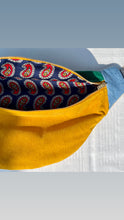 Load image into Gallery viewer, One-of-a-kind tote sling bag. Luxurious green and canary yellow cotton needlecord. Lined with a gorgeous red paisley cotton poplin fabric.
