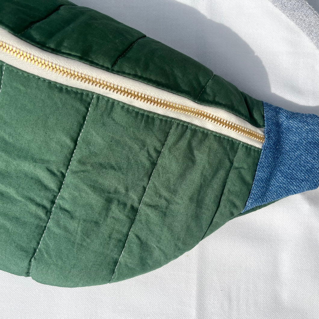 One-of-a-kind tote sling bag. Gorgeous green quilted cotton. Lined with a blue and pink striped cotton poplin fabric.
