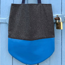 Load image into Gallery viewer, Tote bag. Grey wool tote with a two-colour blue and purple leather round bottom.
